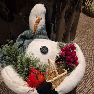Festive Snowman Holiday Decor with Cardinal Accents And Berries.